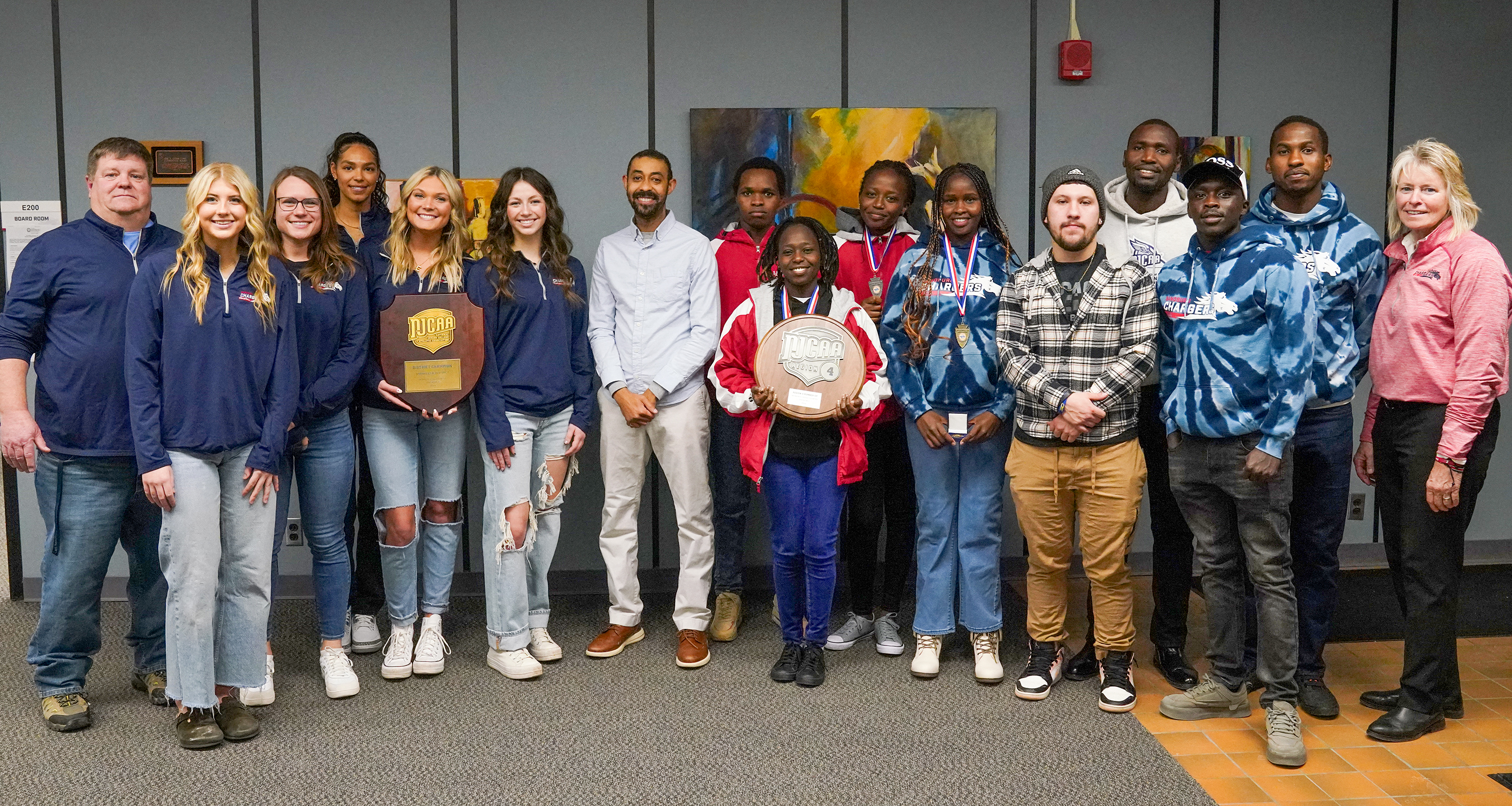 Volleyball and cross country teams recognized at board meeting