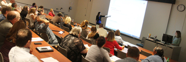 lecture hall full of faculty.